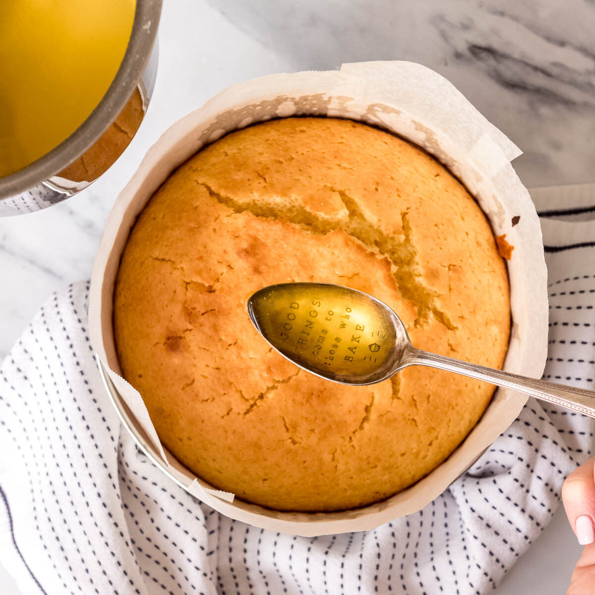 Drizzle citrus syrup over the warm cake.