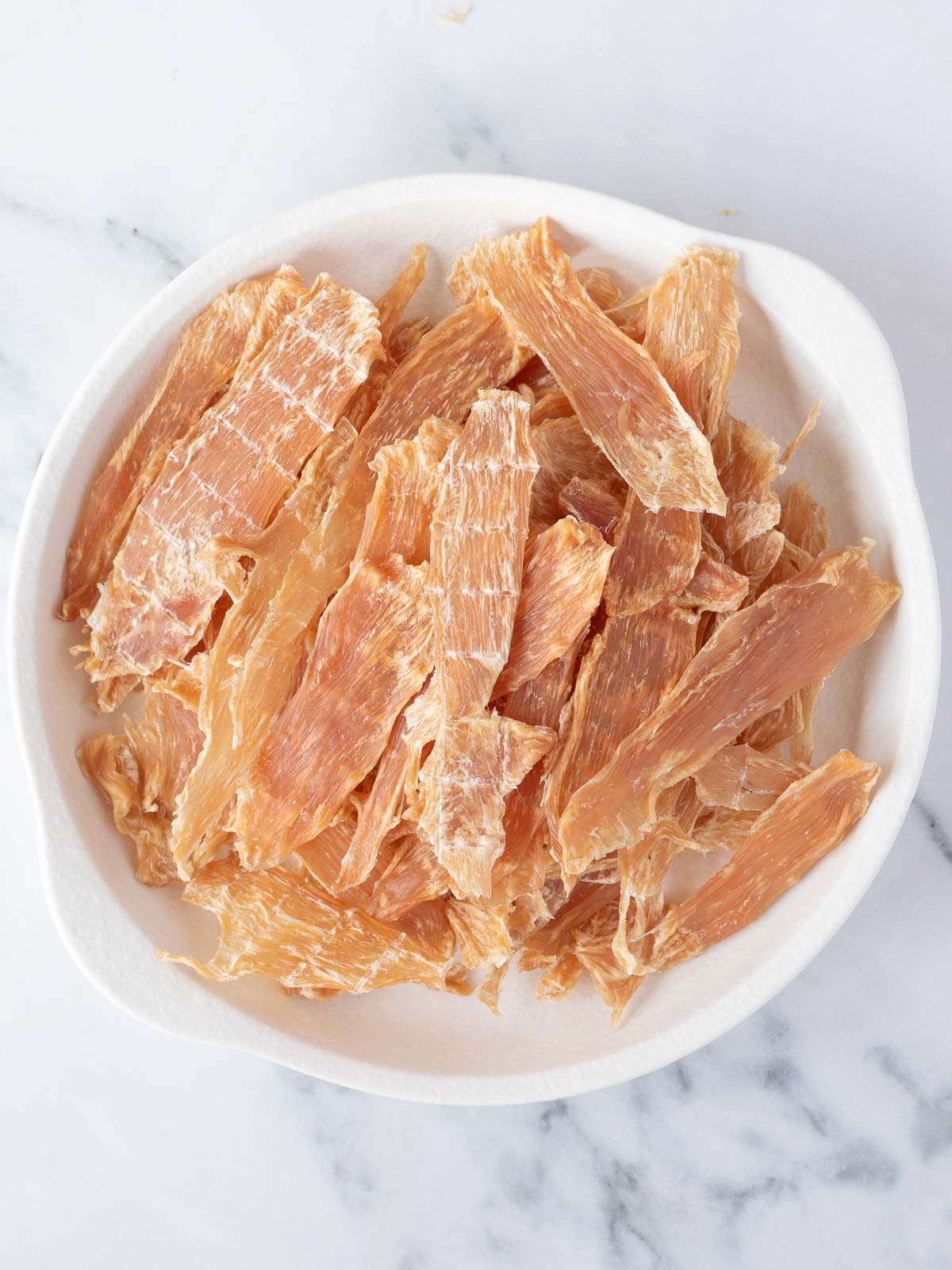 Crispy dehydrated chicken dogs treats will last for months, making them perfect for gifting.