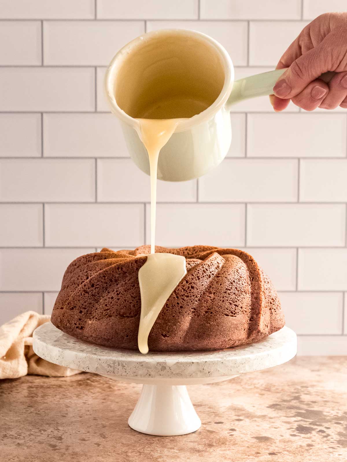 Gingerbread Bundt cake can be served dusted with icing sugar, or drizzled with a maple cream cheese glaze.