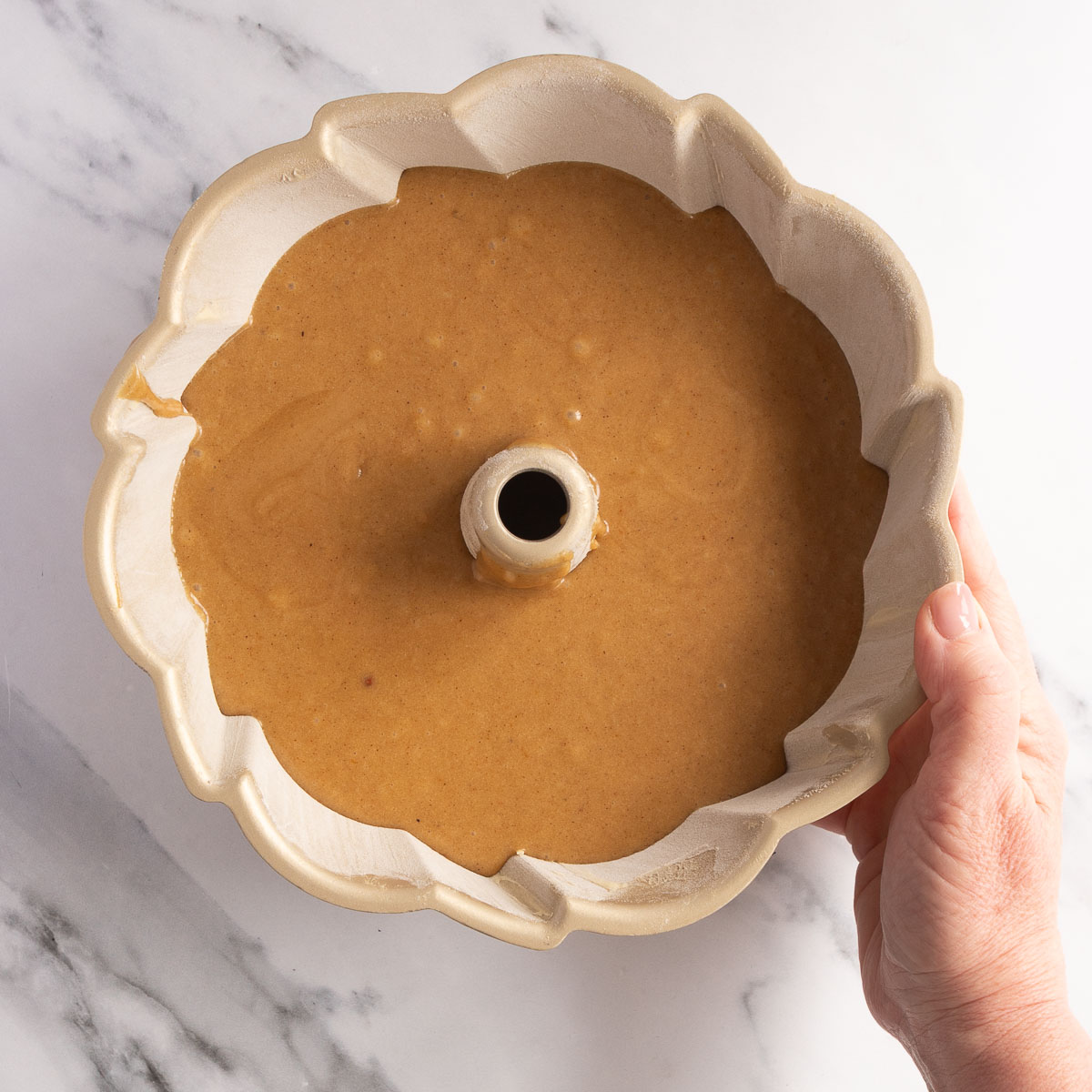 How to correctly fill a bundt tin with cake batter.