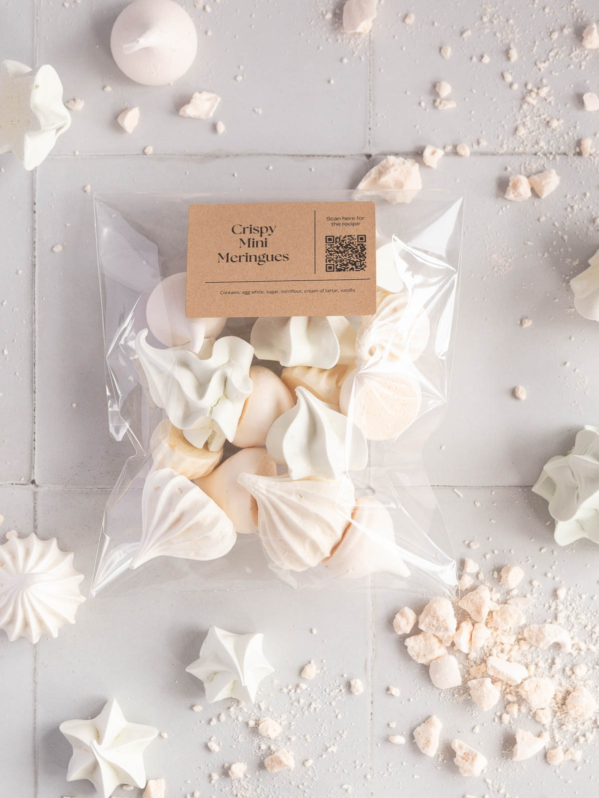 Crispy mini meringues in a heat-sealed, food-safe bag, perfect for gifting.