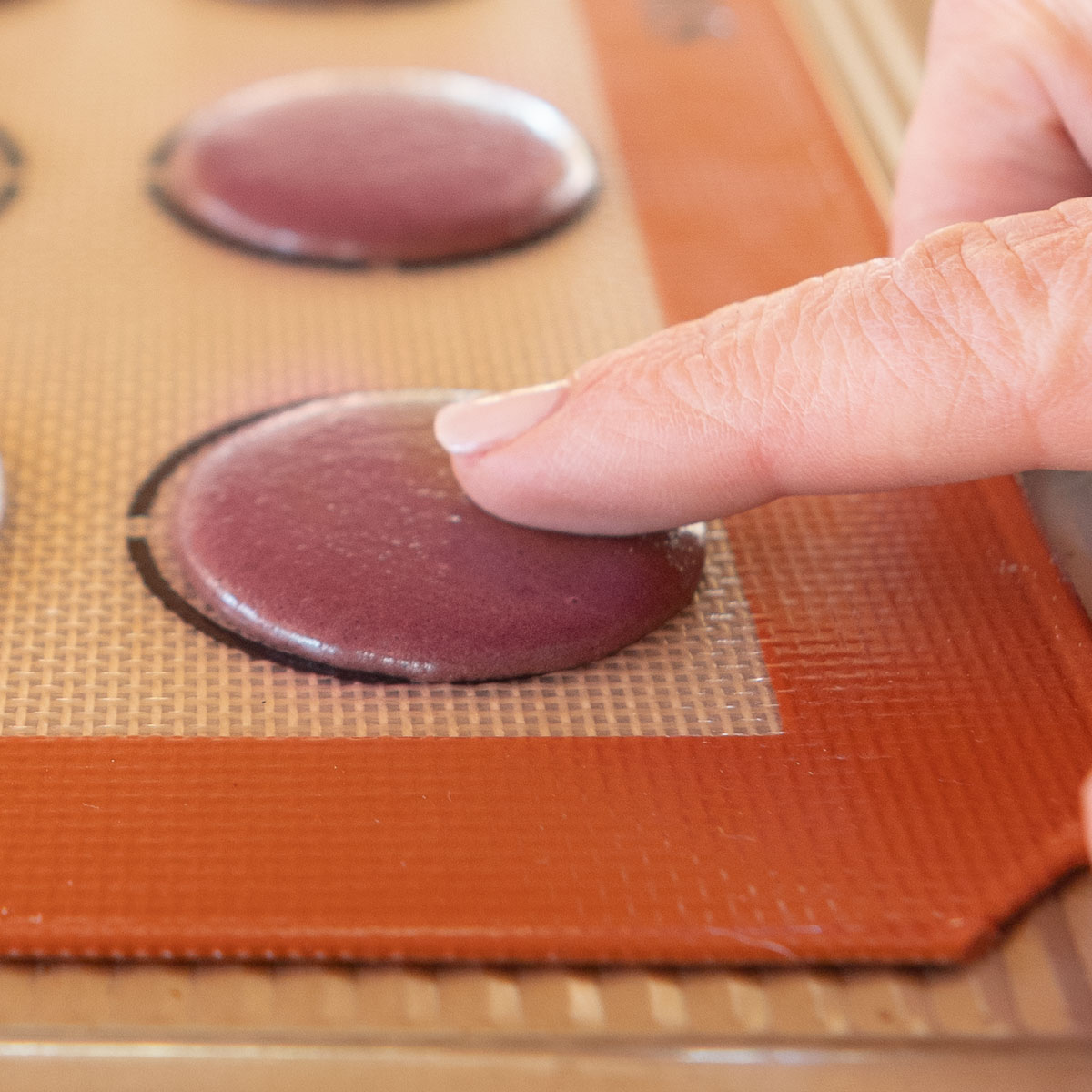 Let macarons rest for 15 minutes, so the shells dry a little.