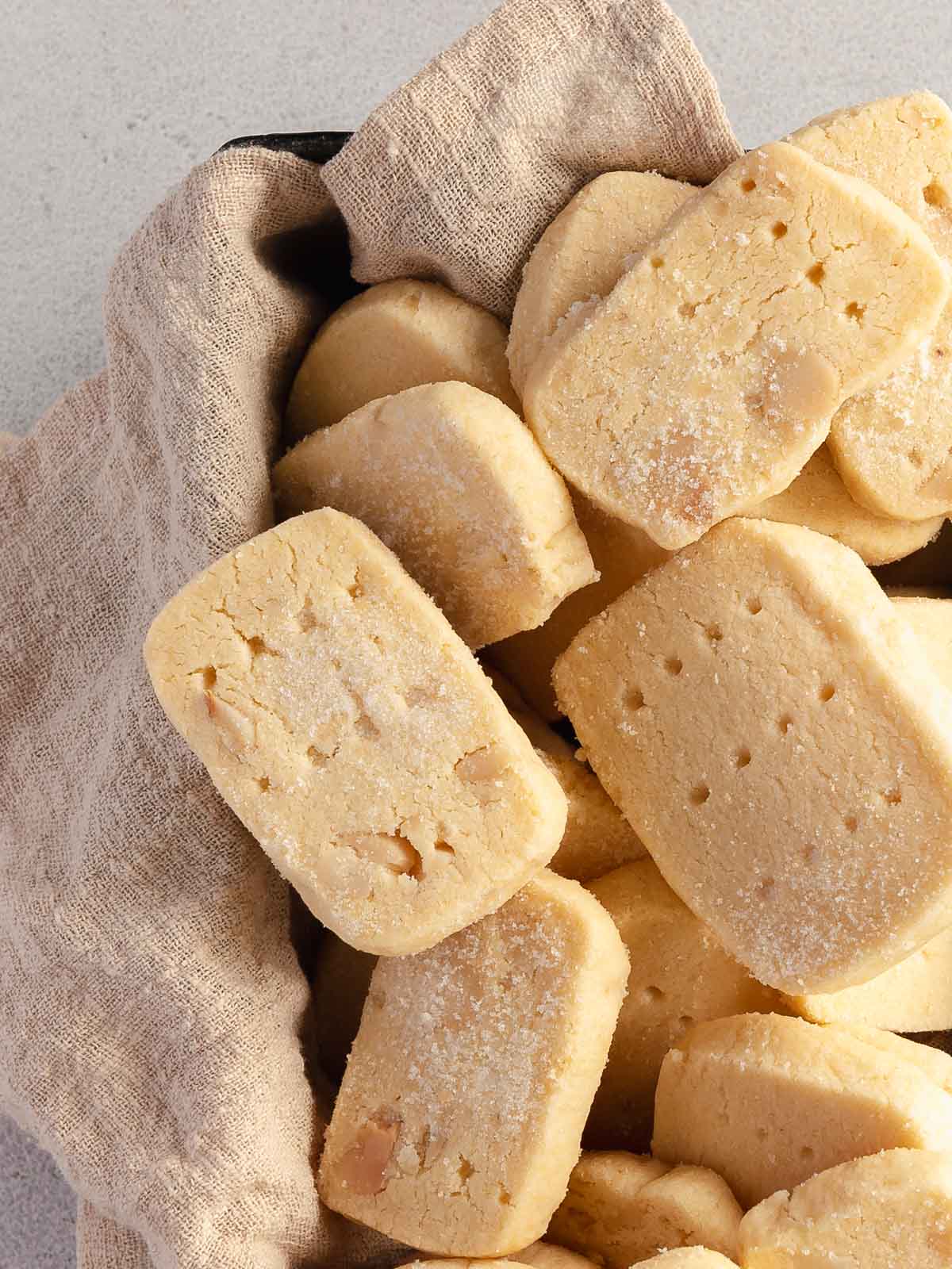 Lightly golden, buttery shortbread with crunchy macadamia nuts.