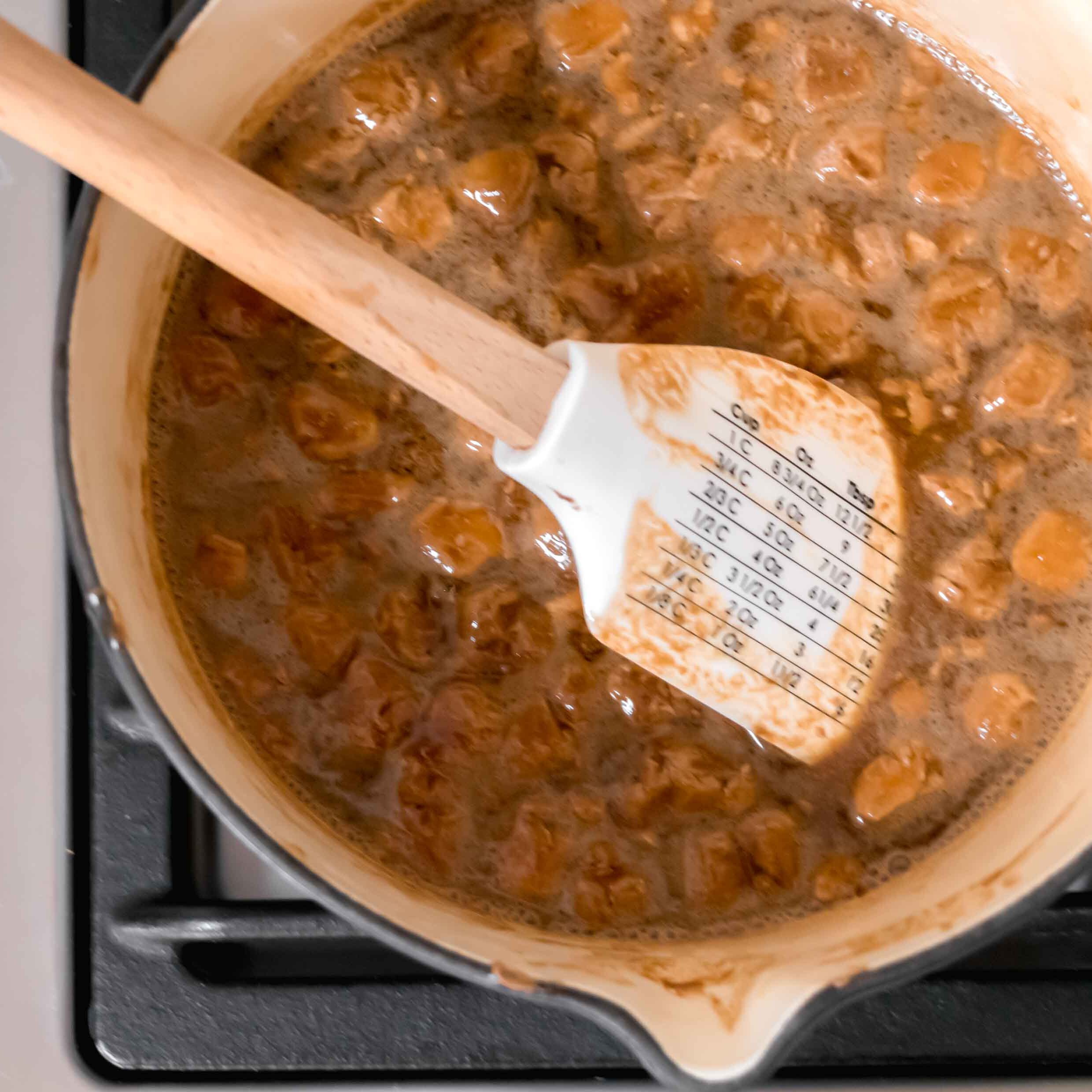 Melting butter and mars bars over a low heat.